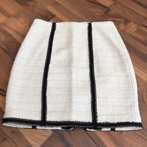 Bebe boucle skirt with ribbon trim